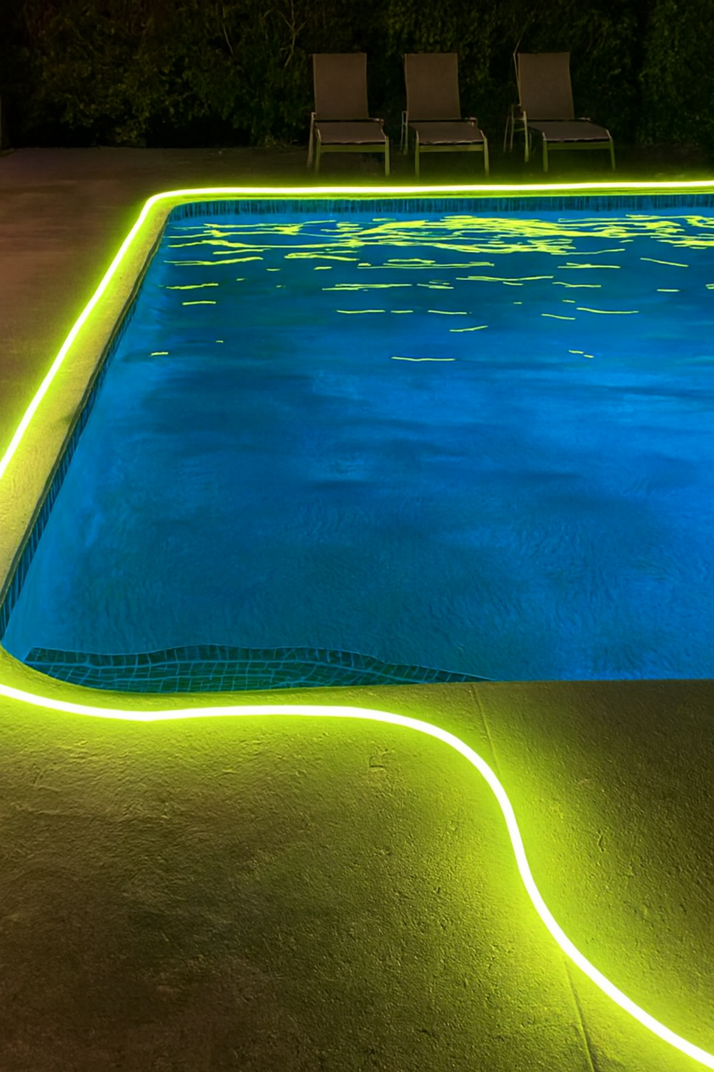 LED fiber lighting creating a stunning nighttime pool scene