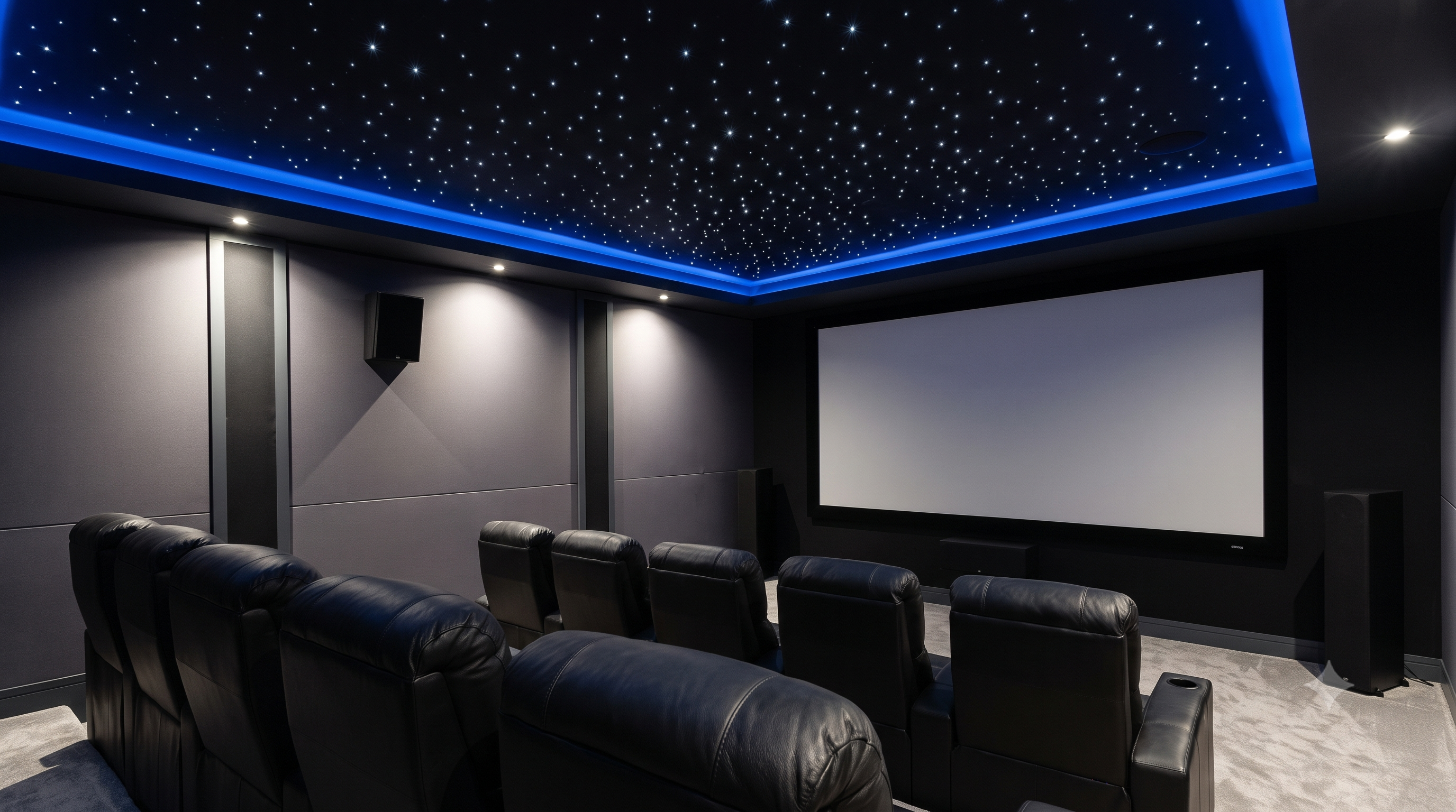 Stunning fiber optic starlight ceiling in luxury home theater showing hundreds of twinkling stars against a dark ceiling creating immersive night sky effect